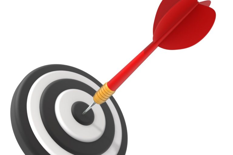 Dart with Bullseye Target A red dart hits the center of a black-and-white target.